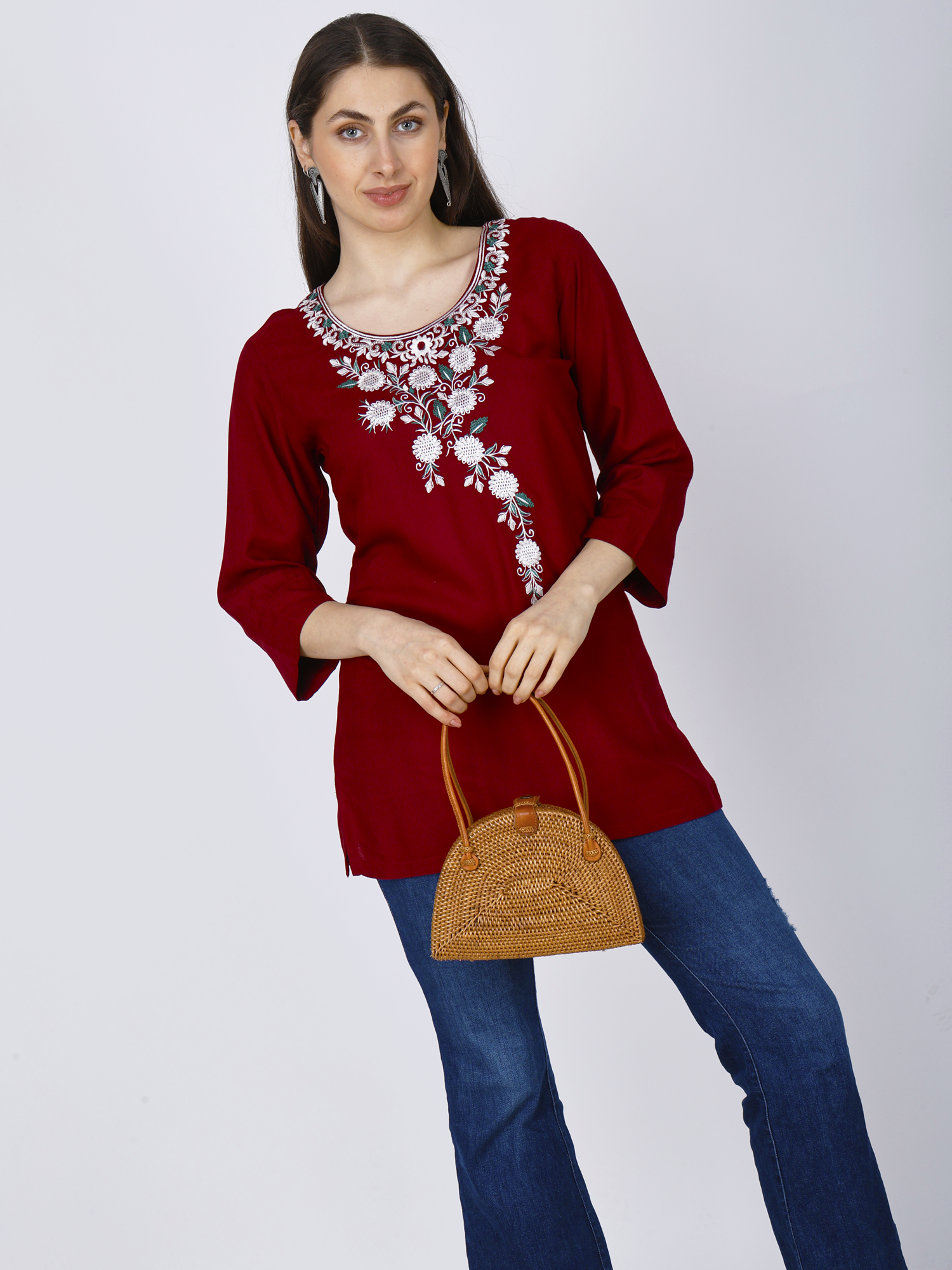 Women's red short kurti with white floral embroidery, front view with 3/4 sleeves