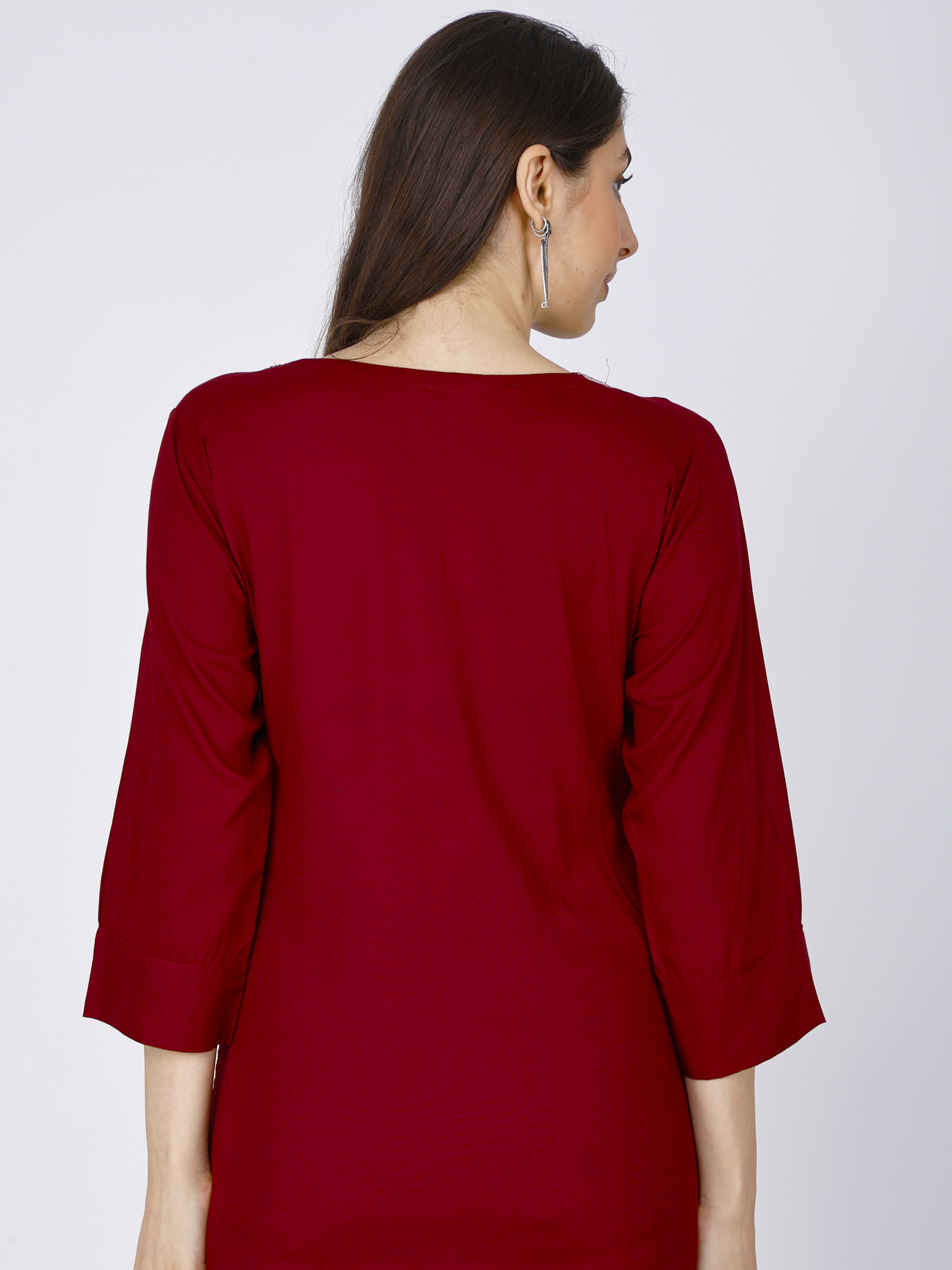 Women's red short kurti with 3/4 sleeves, back view