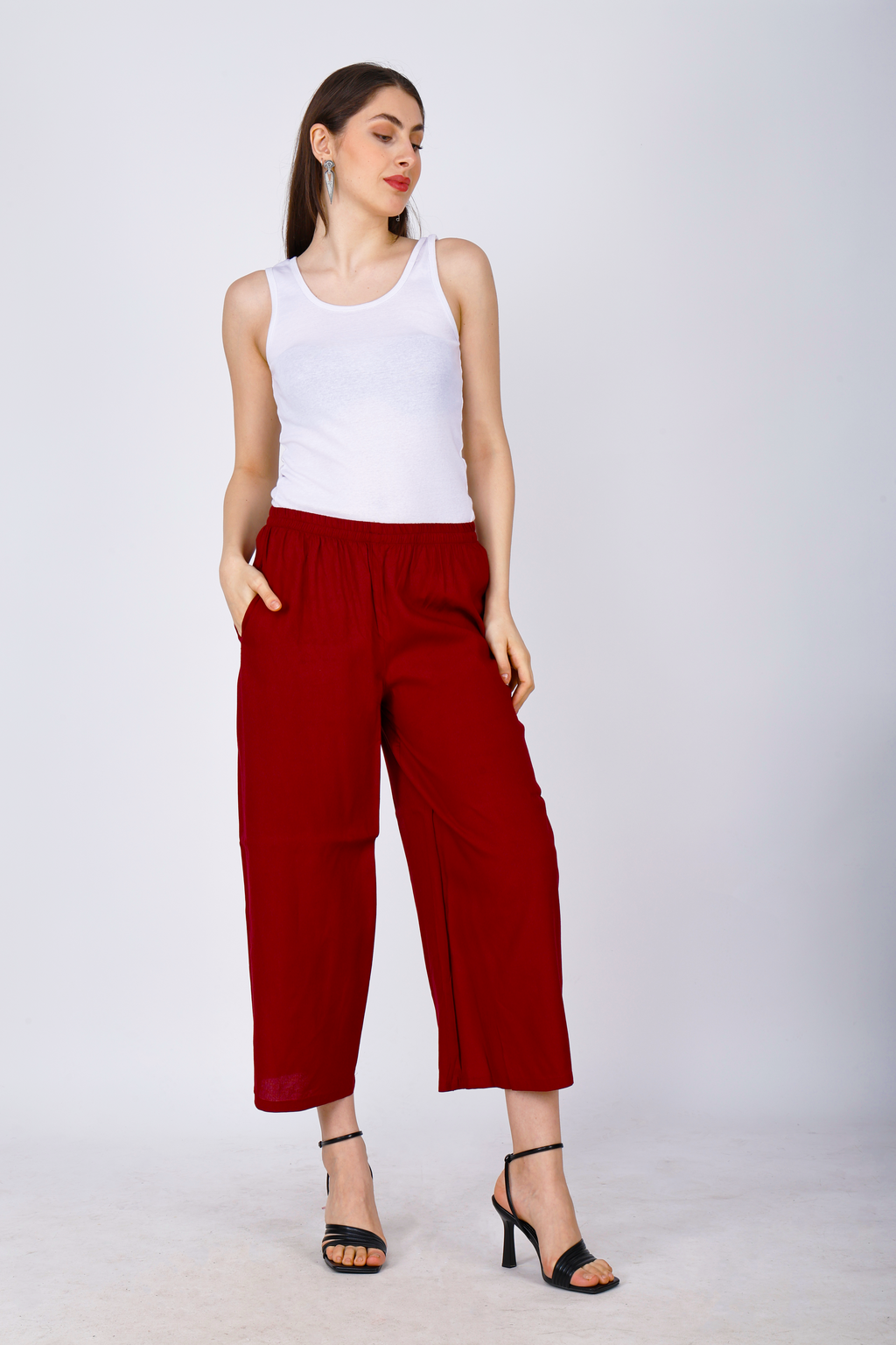 Women’s maroon palazzo pants with elastic waistband and wide ankle-length legs