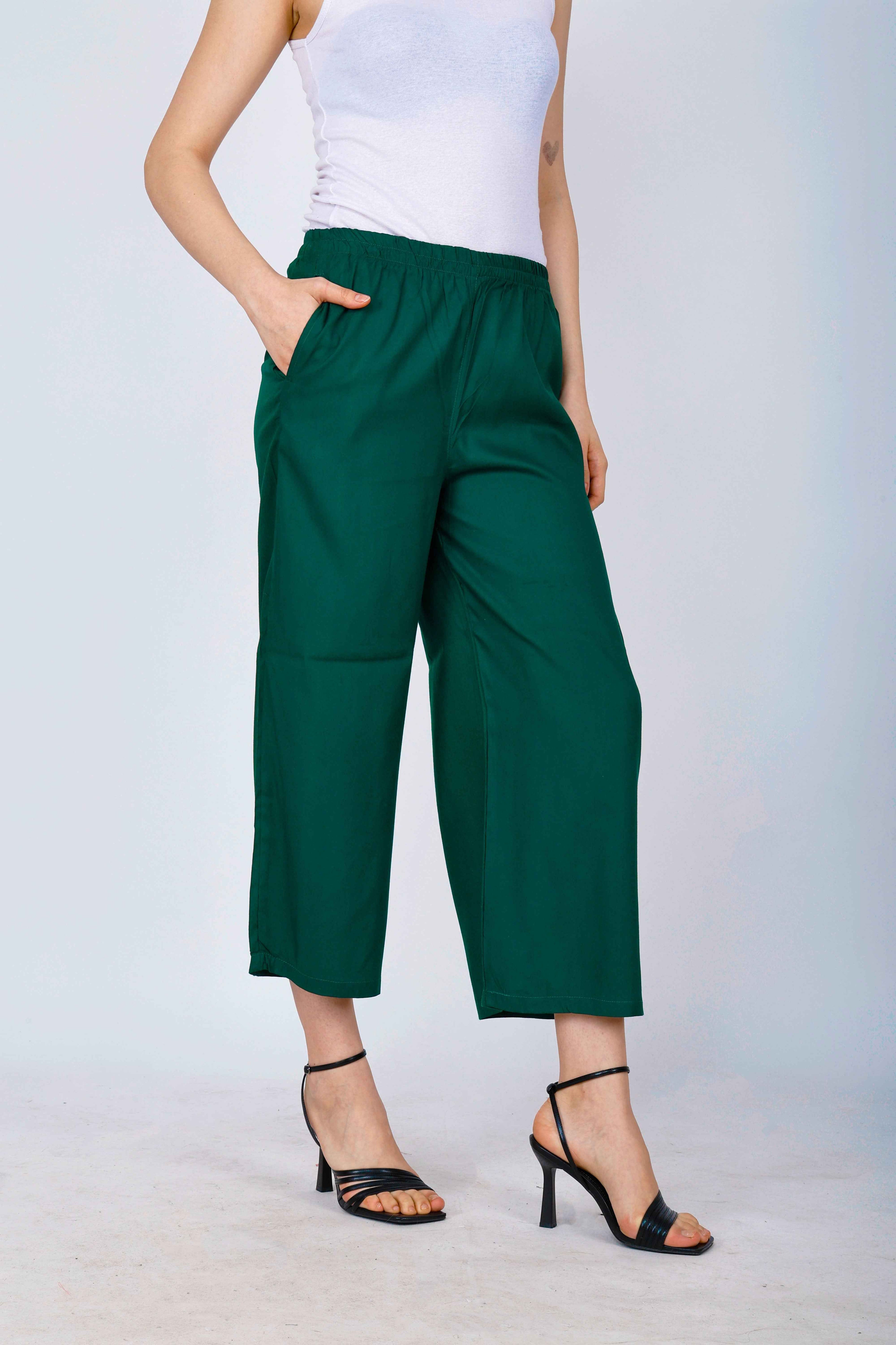 Women’s dark green palazzo pants, side view with wide straight legs and ankle hem