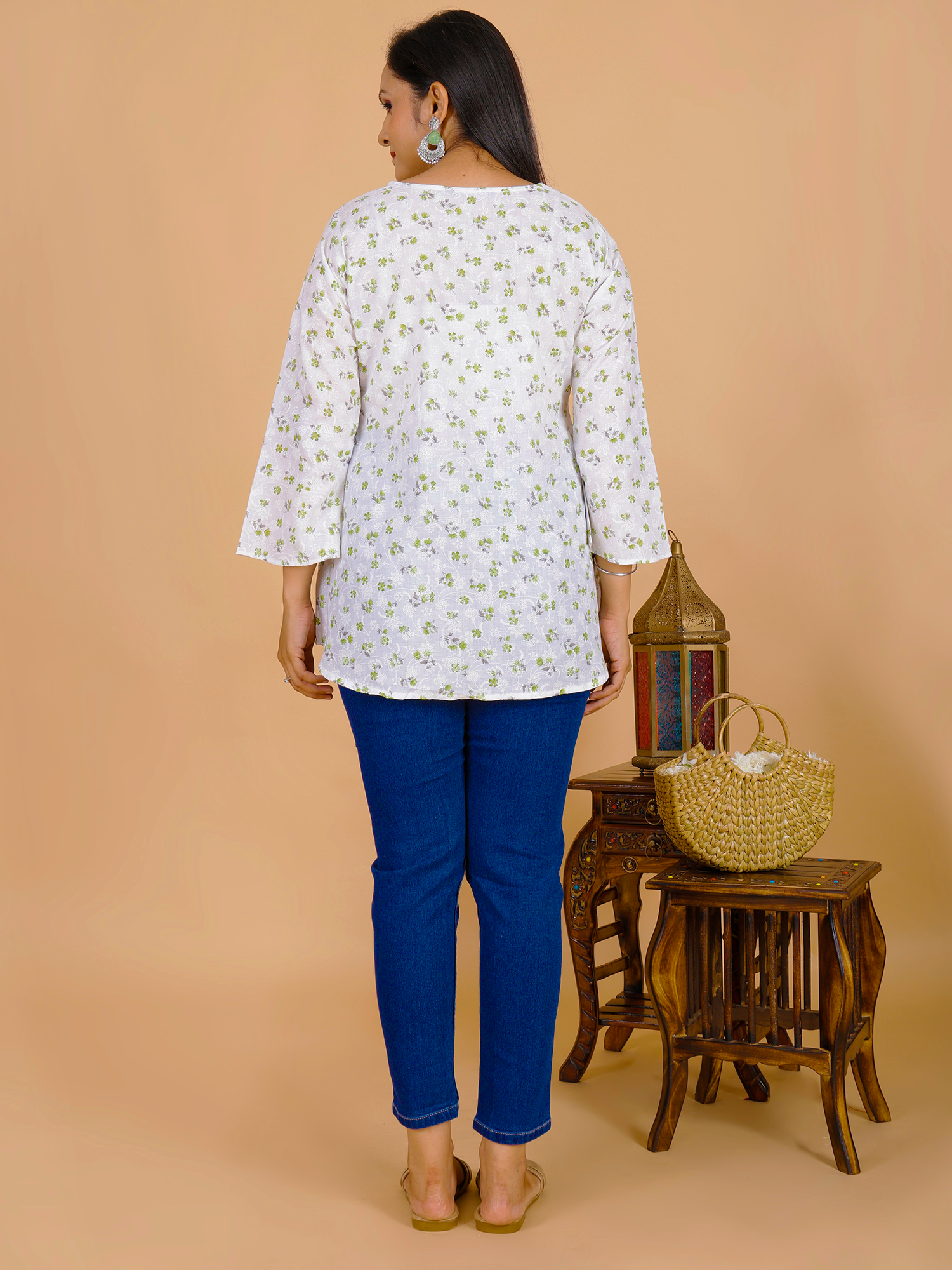 Floral tunic dress, white with small green print, back view, 3/4 sleeves