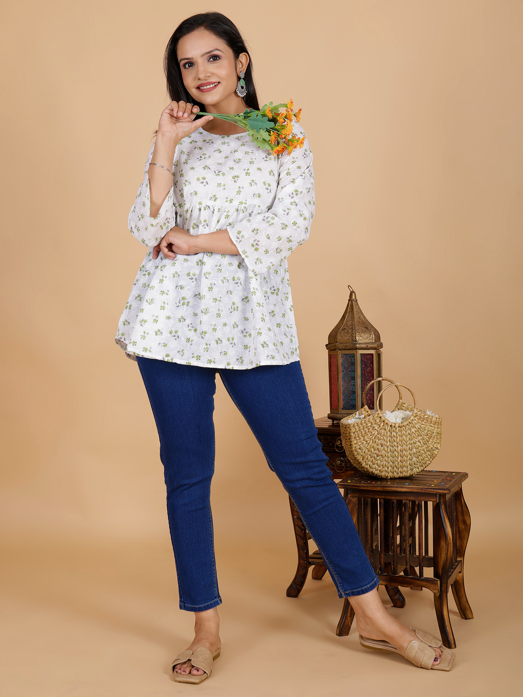 Floral tunic dress in white with small green print, curved hem, round neck, 3/4 sleeves