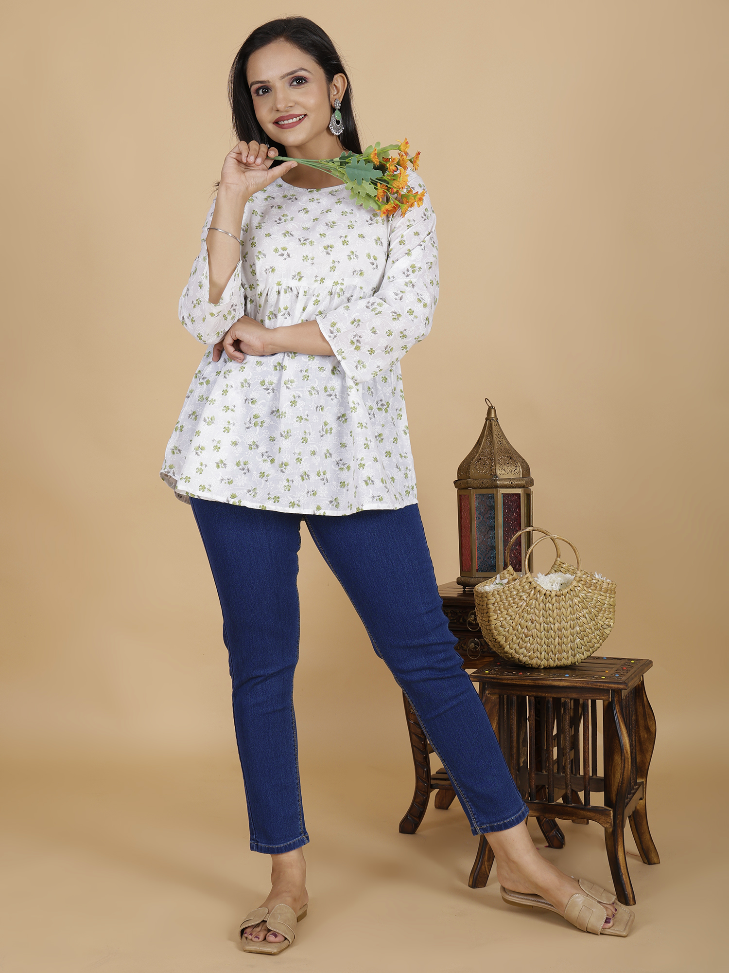 Floral tunic dress in white with small green print, curved hem, round neck, 3/4 sleeves