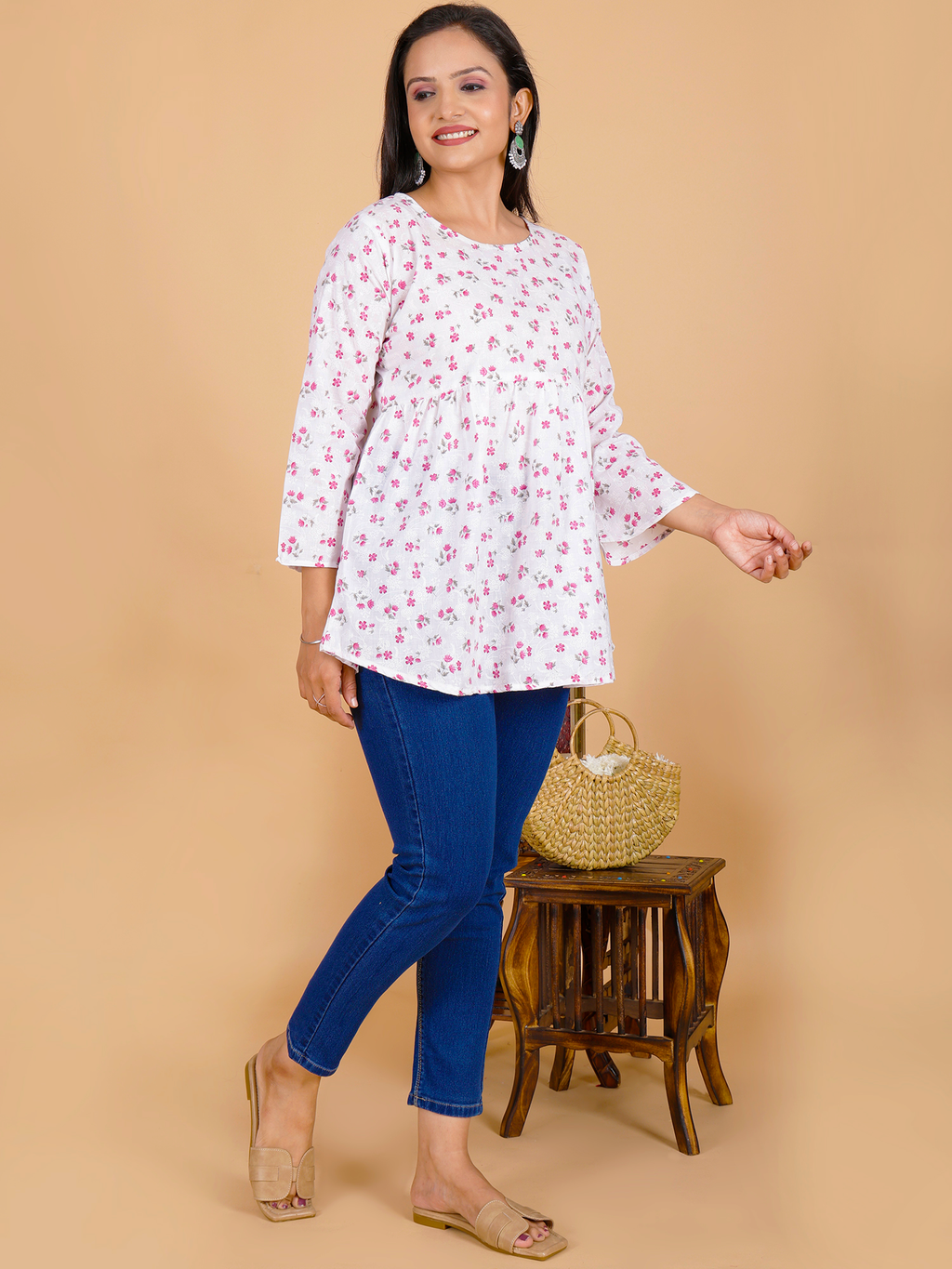 Floral tunic top with round neck, white with maroon/pink flower print, 3/4 sleeves