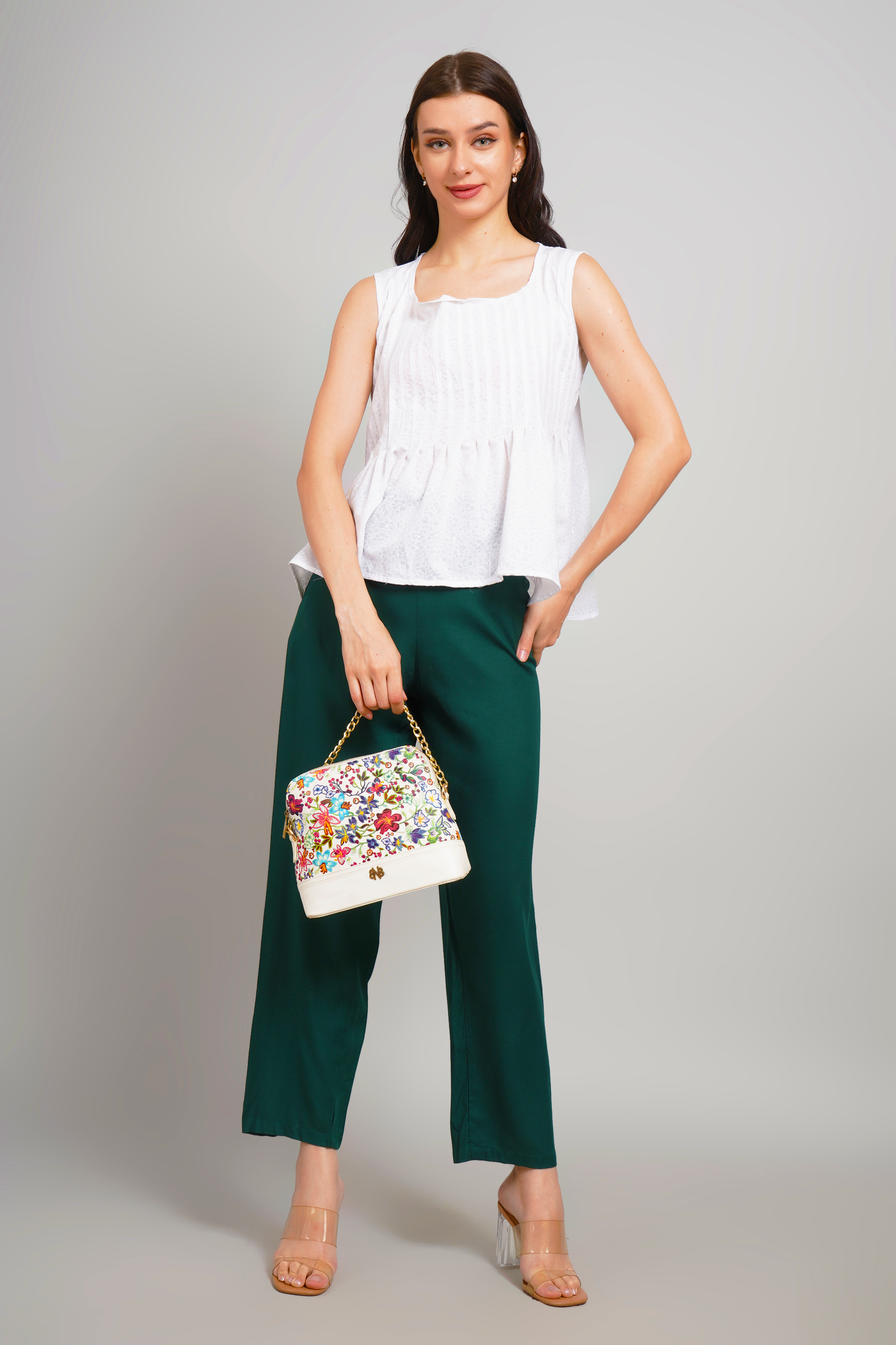 Women’s dark green straight ankle-length trousers with front creases