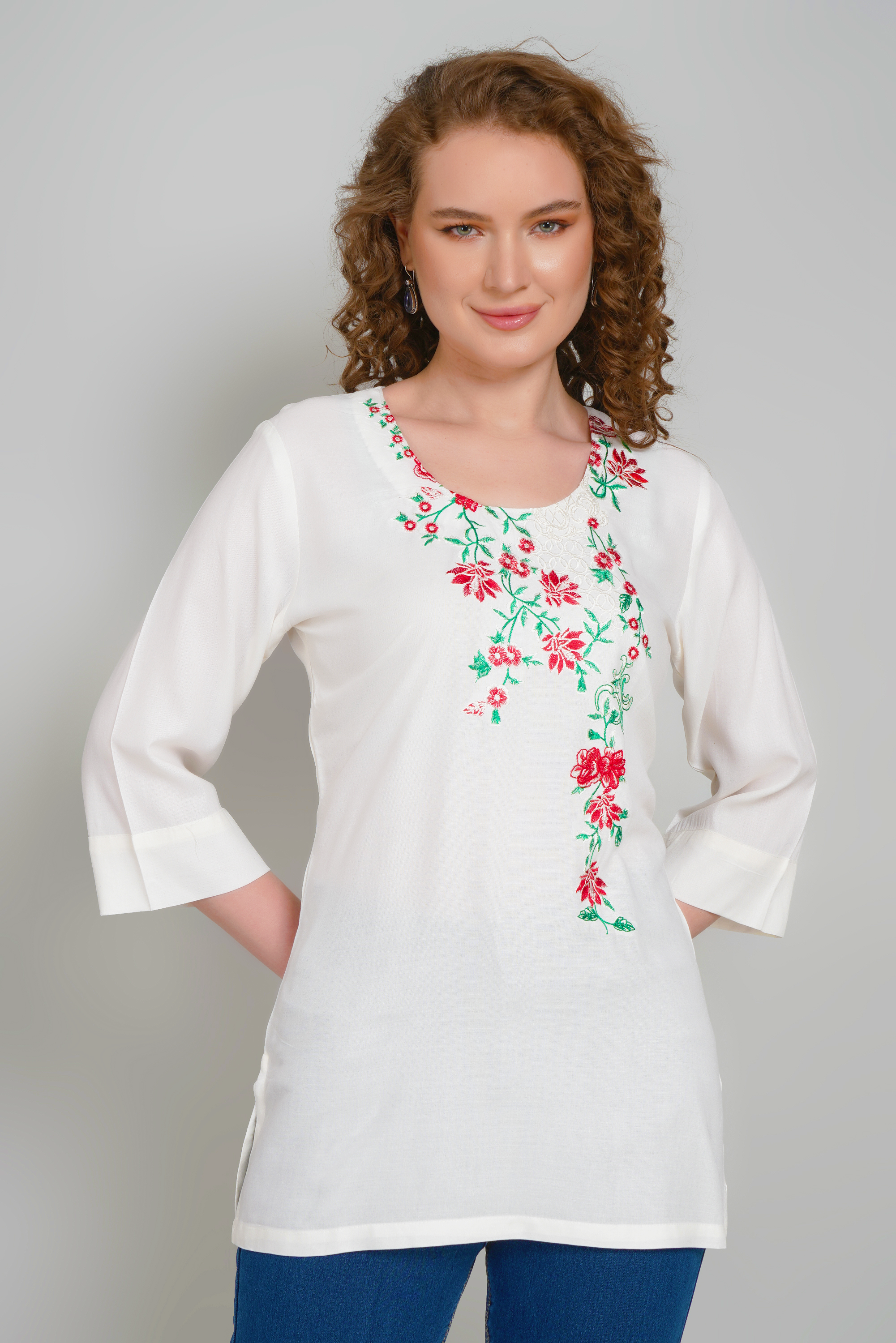 Women’s off-white tunic with floral embroidered V-neck and 3/4 sleeves