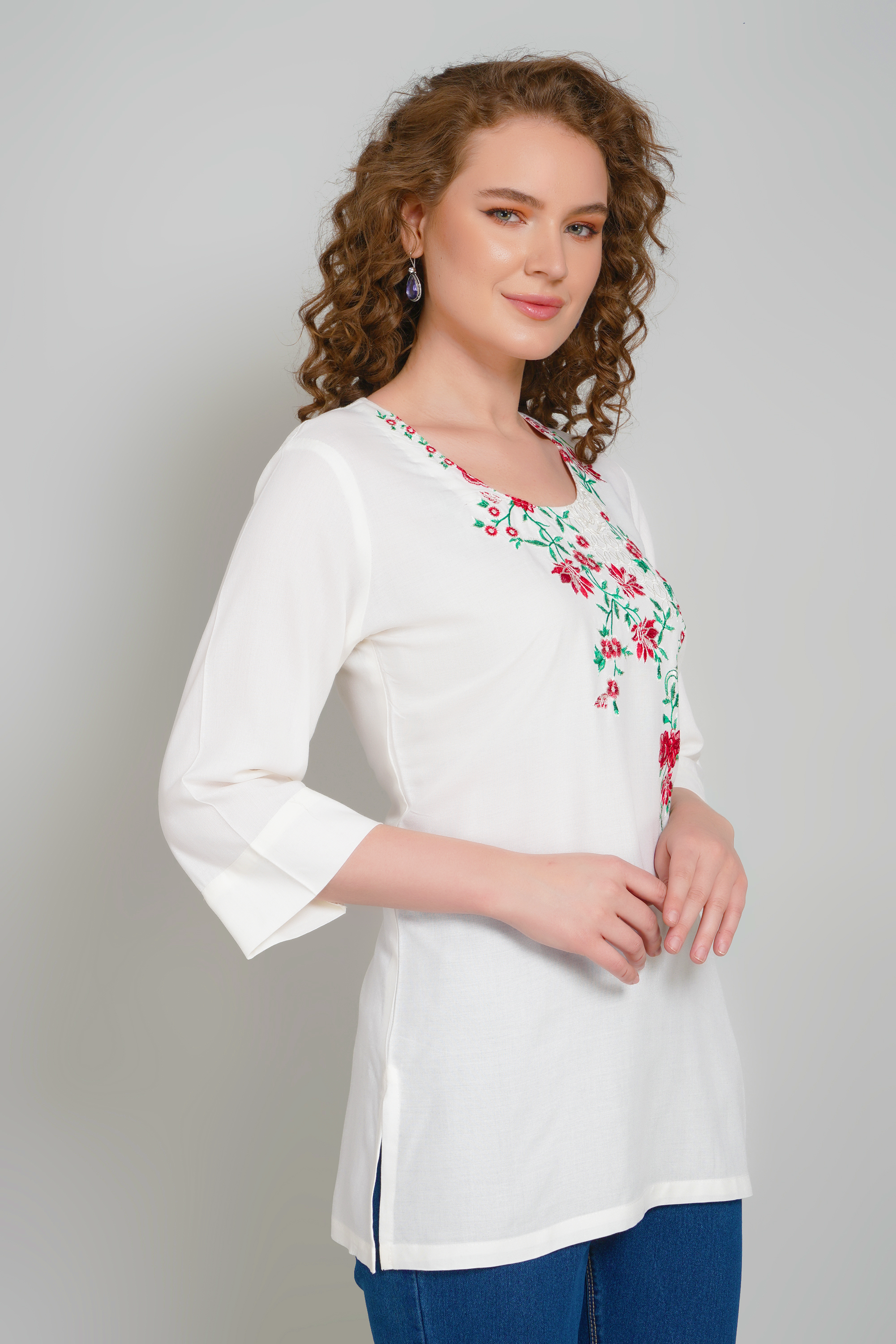 Women’s off-white tunic with floral V-neck embroidery and 3/4 sleeves