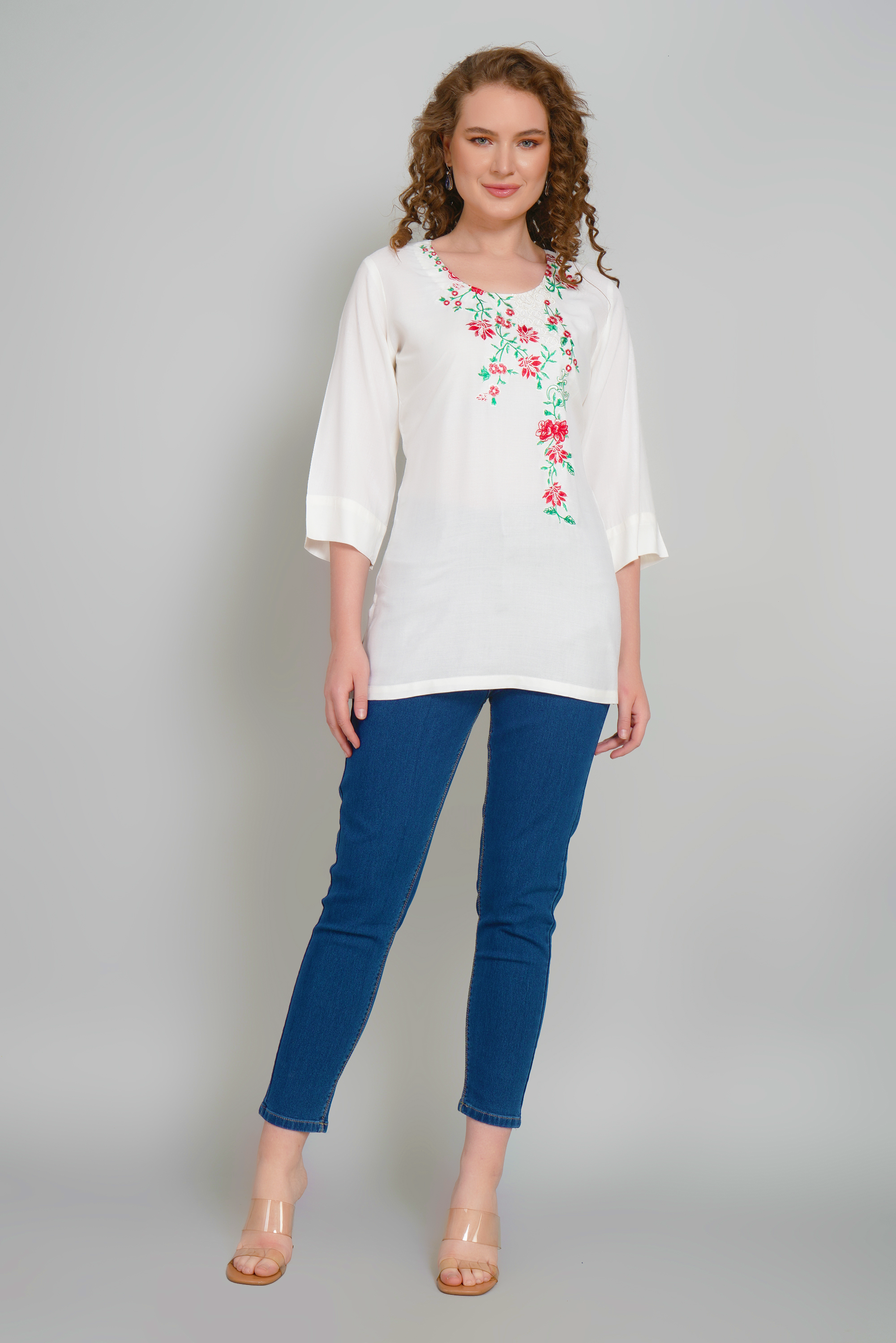 Women’s off-white tunic with floral V-neck embroidery and 3/4 length sleeves