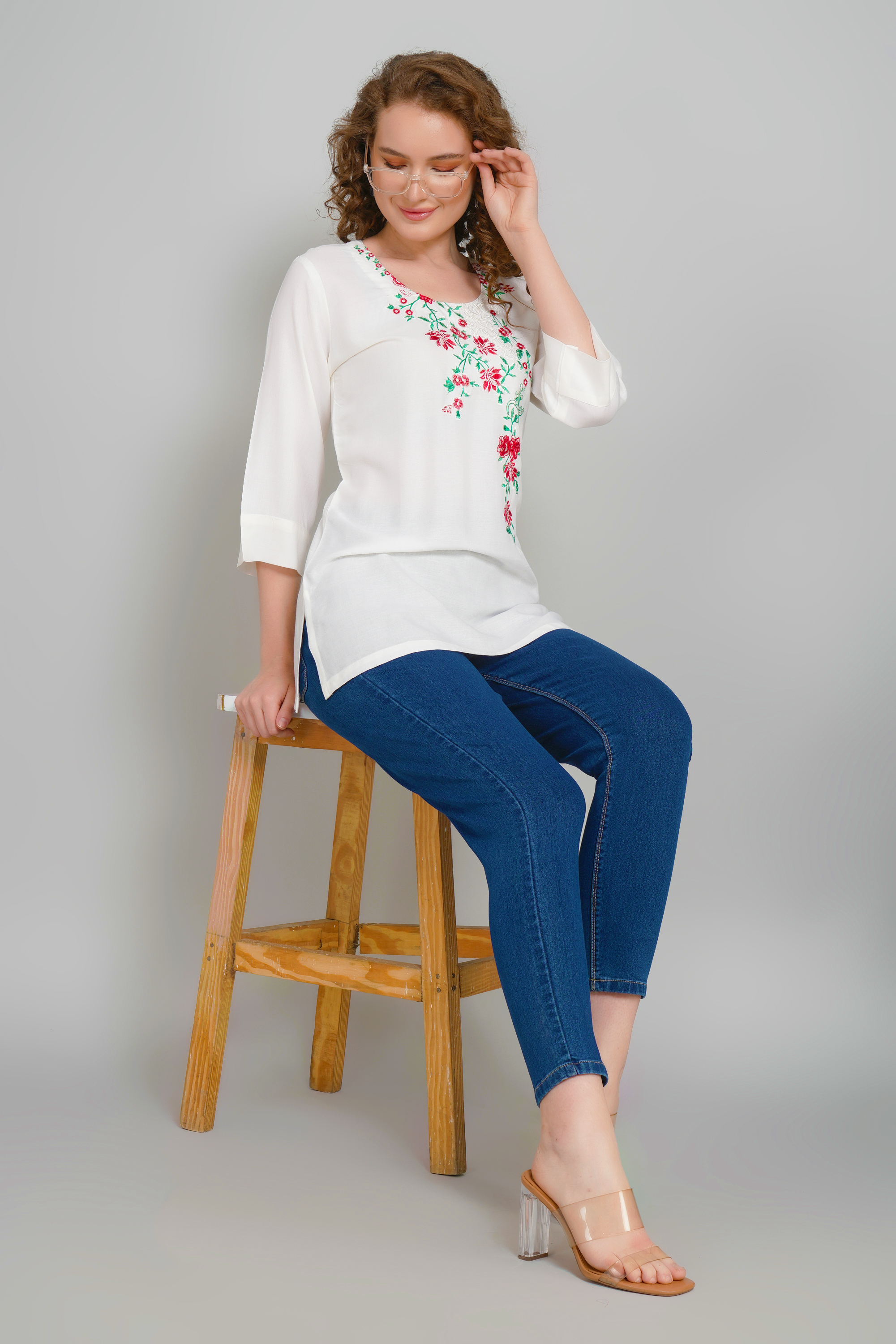 Women’s off-white tunic with floral embroidered V-neck and 3/4 sleeves