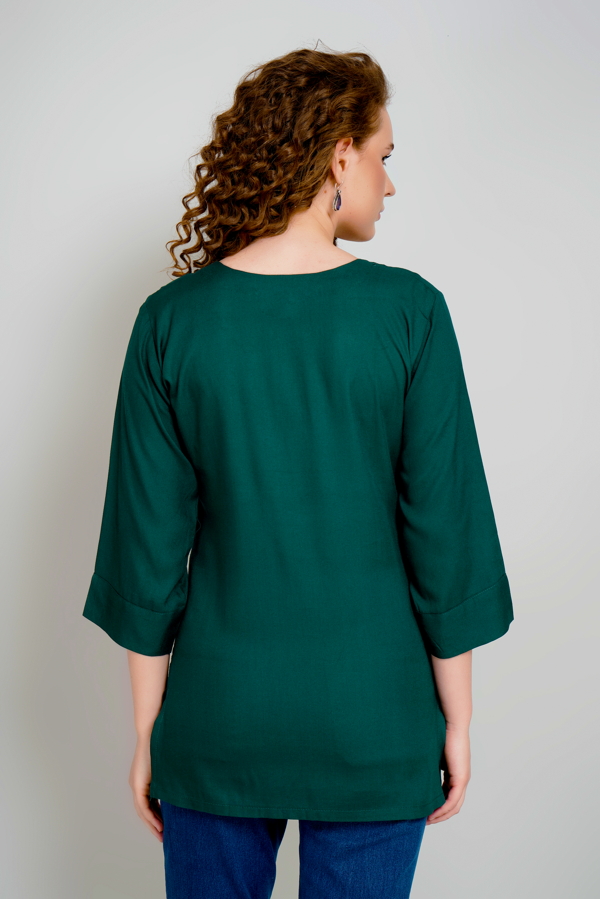 Dark green short kurti with 3/4 sleeves, plain back