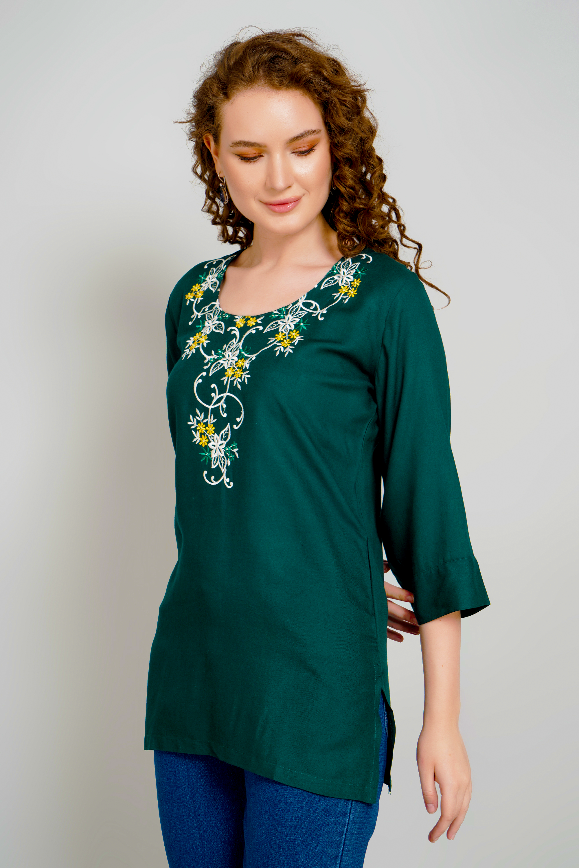 Dark green short kurti with gold floral neckline embroidery, elbow-length sleeves