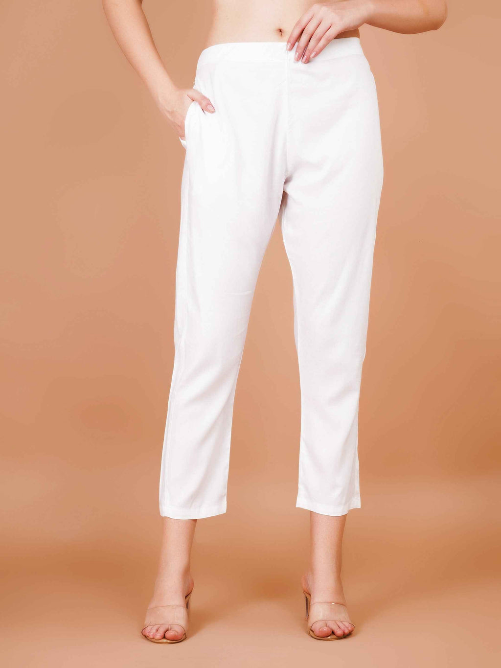 Women's white capri trousers with tapered legs and cropped hem