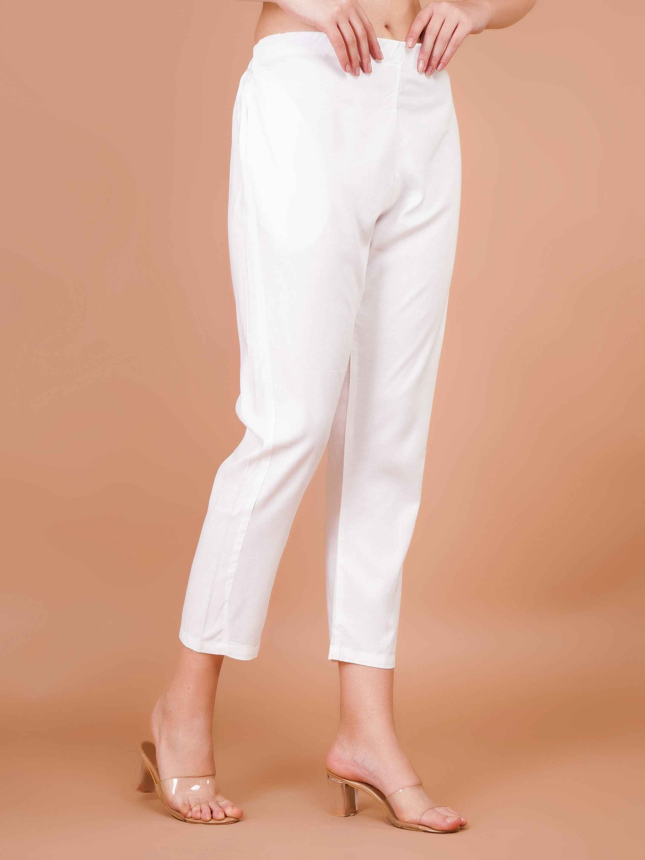 Women's white capri trousers, three-quarter view, cropped tapered leg