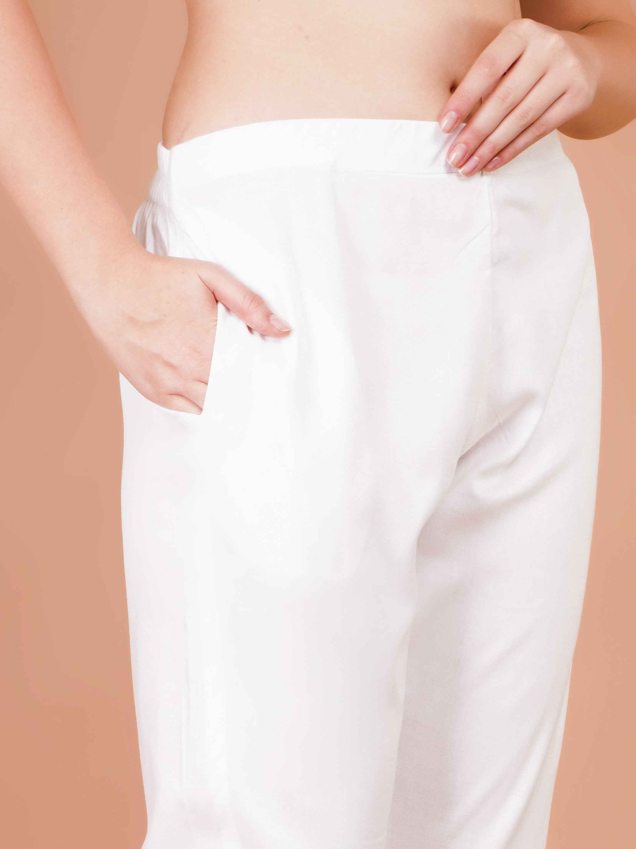Women's white capri trousers back view with waistband seam and side pocket openings