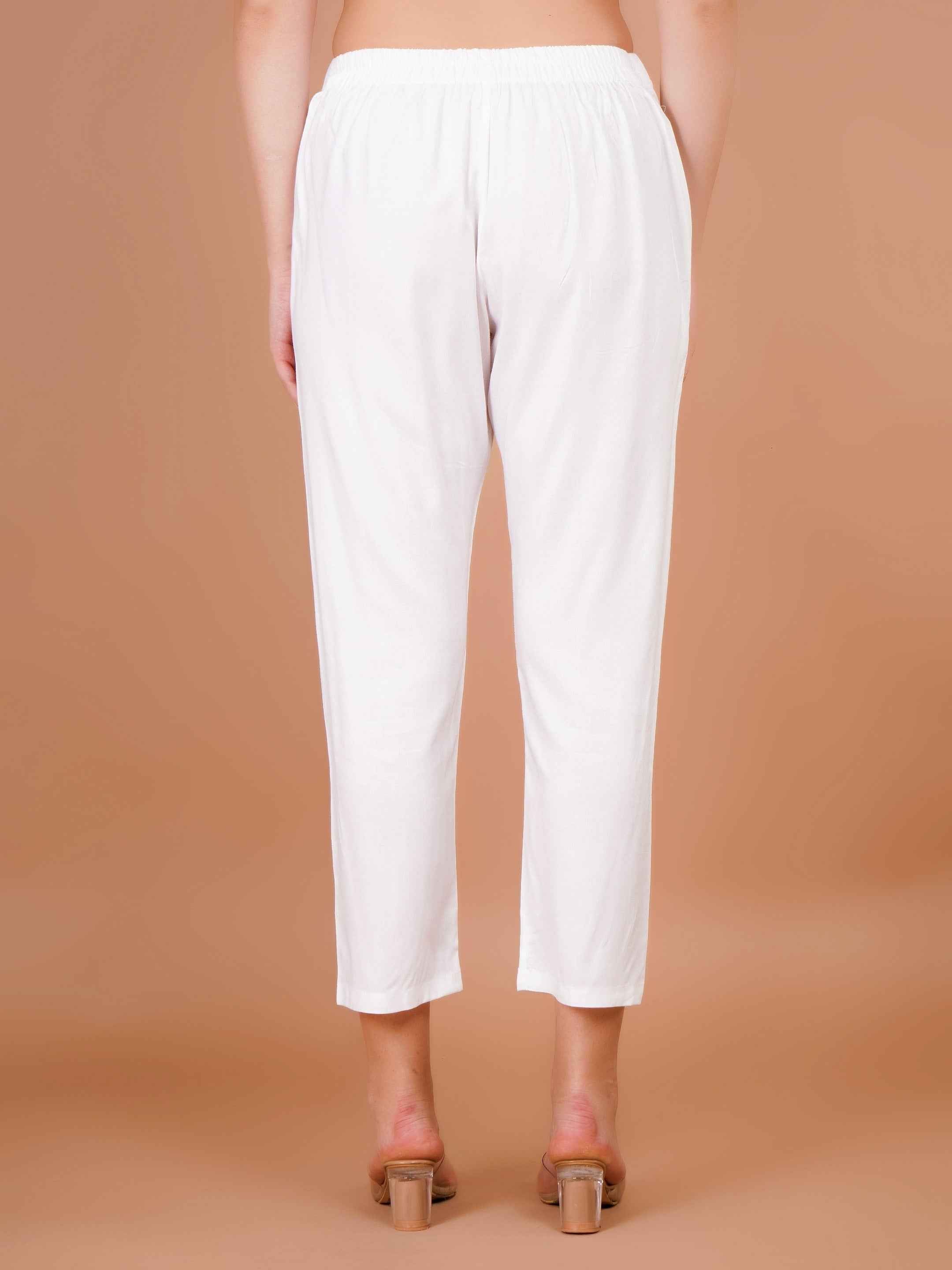 Women's white capri trousers back view with elasticated waistband and tapered leg