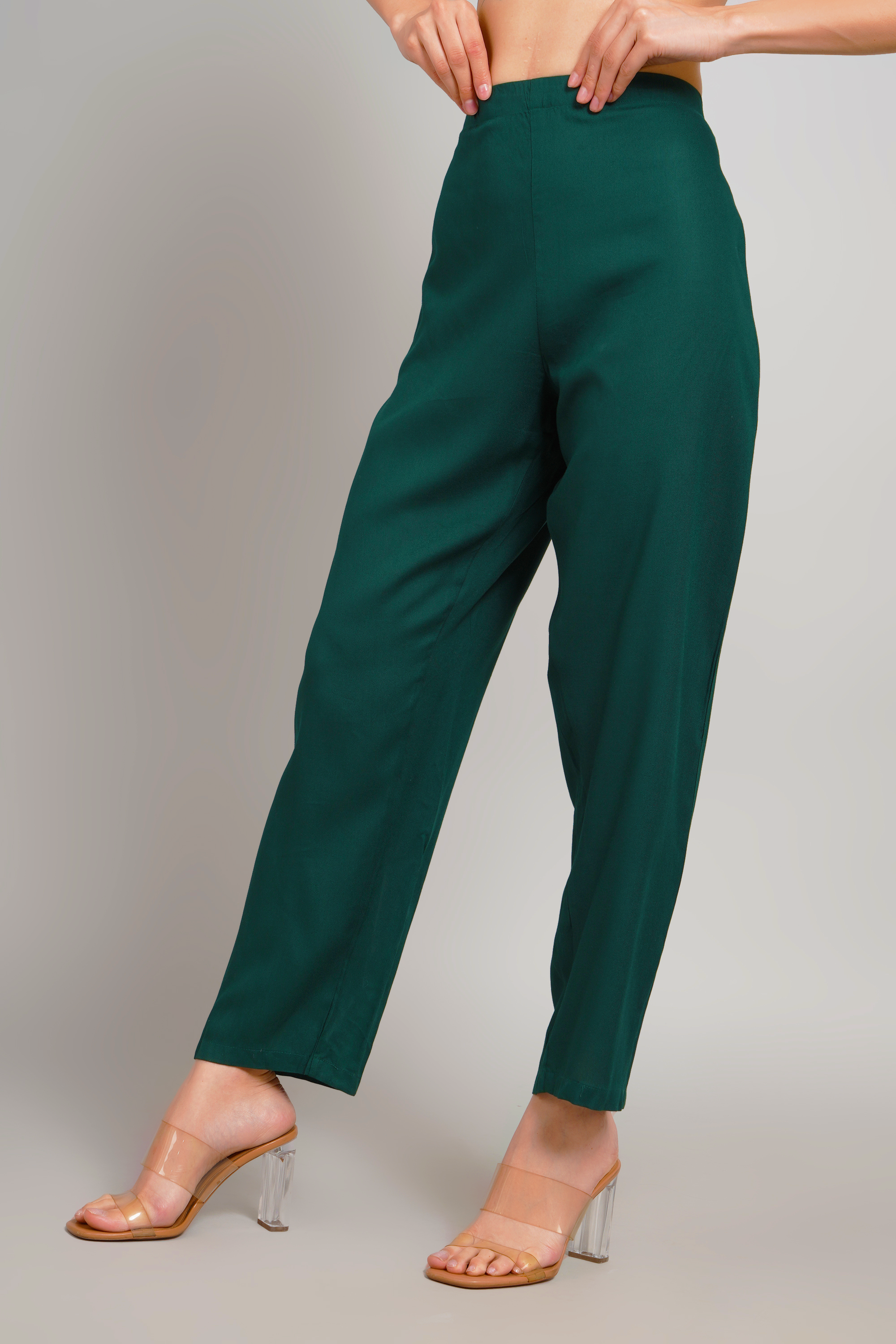 Women’s dark green trousers front view with relaxed straight-leg drape