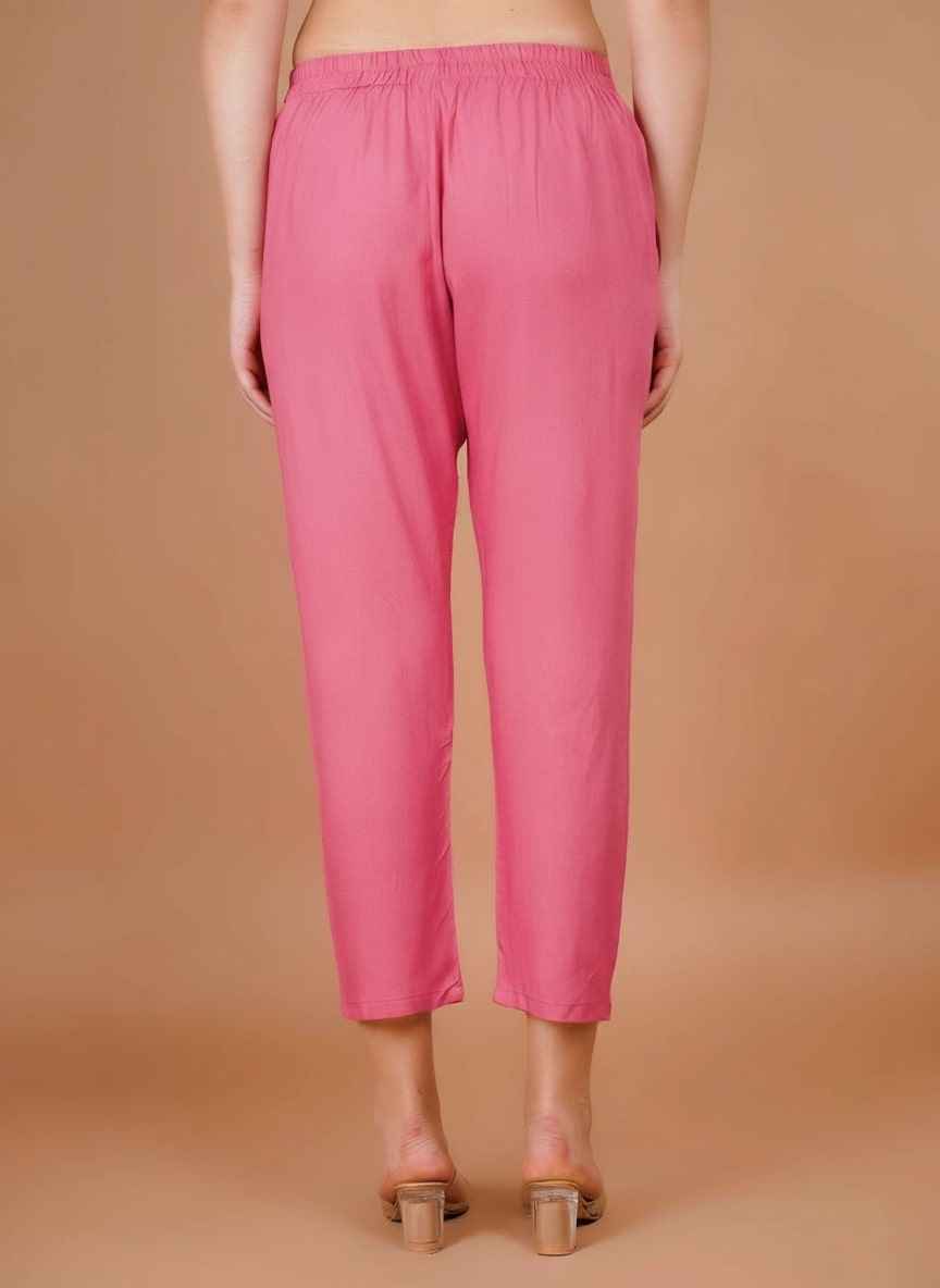 Women’s pink formal trousers with elastic waist and ankle-length straight legs